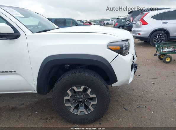 3TMDZ5BN2PM157338 2023 TOYOTA TACOMA White Դիմացի տեսք
