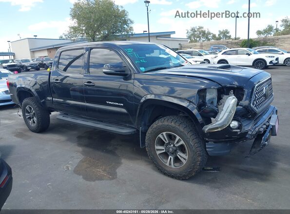 3TMDZ5BN3JM054100 2018 TOYOTA TACOMA Black Вид задньої частини салону