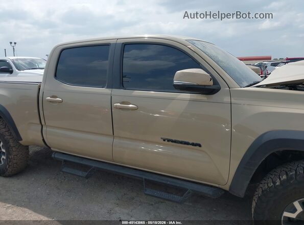 3TMDZ5BN8JM049653 2018 TOYOTA TACOMA Brown Rear interior view