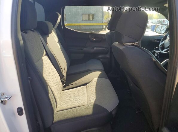 3TMDZ5BN8PM164696 2023 TOYOTA TACOMA White Rear seats view