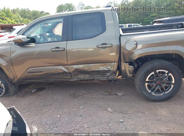 3TMKB5FN6TM068033 2026 TOYOTA TACOMA Золотой Вид спереди