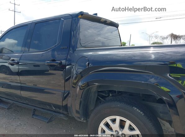 3TMKB5FN9SM034599 2025 TOYOTA TACOMA Black Vista interior trasera