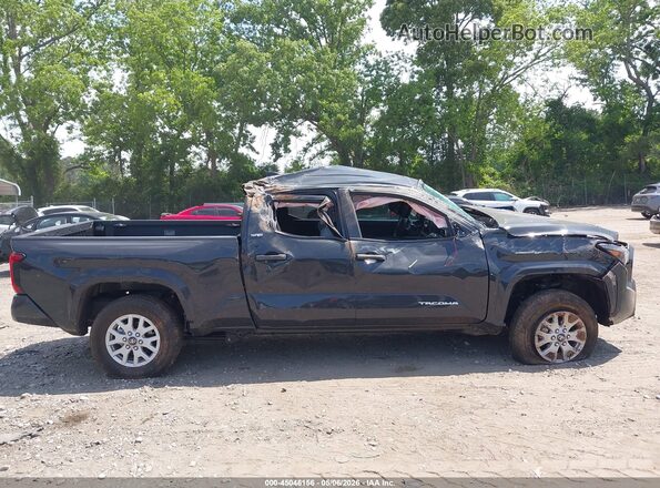 3TMKB5FNXTM062297 2026 TOYOTA TACOMA Gray Rear interior view