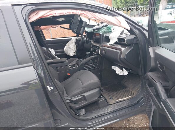3TMLB5JN0SM142119 2025 TOYOTA TACOMA Gray Front interior view