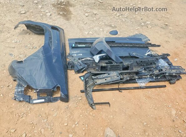 3TMLB5JN1SM128990 2025 TOYOTA TACOMA Charcoal Vista del compartimento del motor
