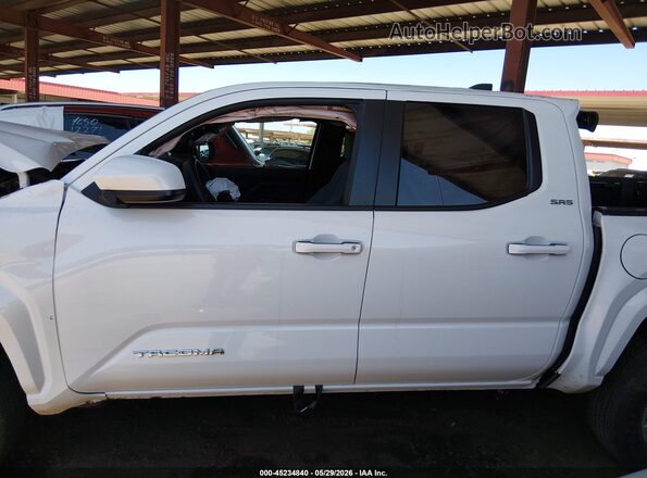 3TMLB5JN1TM237418 2026 TOYOTA TACOMA White Rear interior view