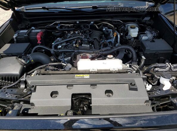 3TMLB5JN4SM172899 2025 TOYOTA TACOMA Black Вид задньої частини салону