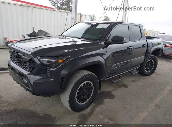 3TMLB5JN5RM030555 2024 TOYOTA TACOMA Black Vista tres cuartos delantera izquierda