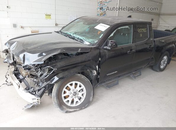 3TMLB5JN5SM147882 2025 TOYOTA TACOMA Black Vista tres cuartos delantera izquierda