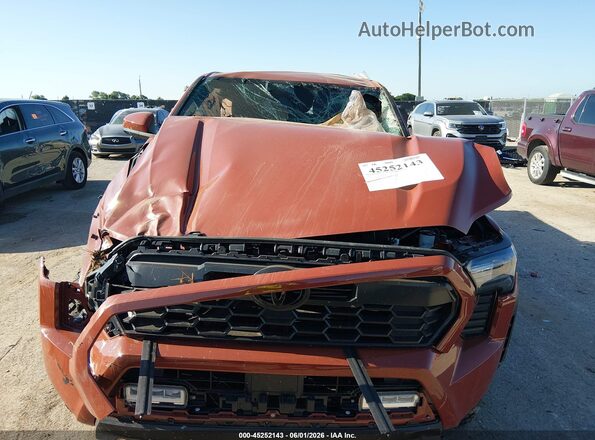 3TMLB5JN6SM099602 2025 TOYOTA TACOMA Orange Engine compartment view