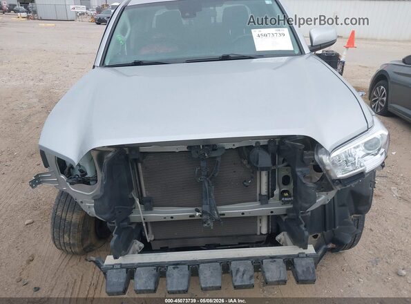 3TYAX5GN6PT073772 2023 TOYOTA TACOMA Silver Widok wnętrza z tyłu