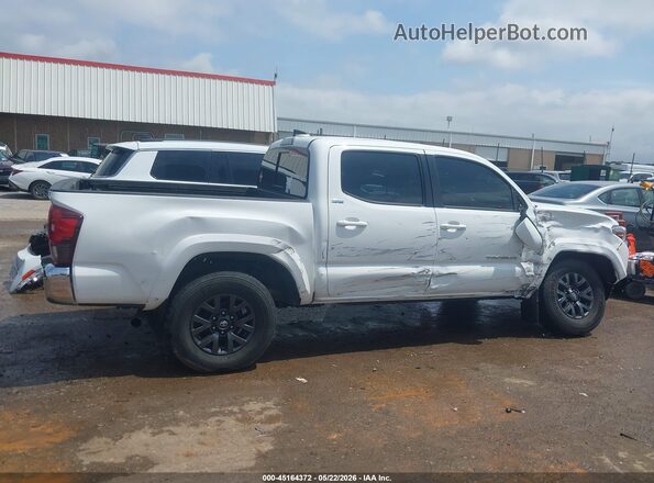 3TYAZ5CN3PT034248 2023 TOYOTA TACOMA White Սալոնի հետևի տեսք