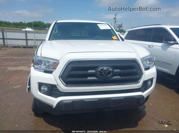 3TYAZ5CN3PT034248 2023 TOYOTA TACOMA White Սարքավորումների վահանակի տեսք