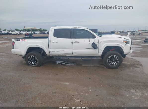 3TYCZ5AN3PT163845 2023 TOYOTA TACOMA White Vista interior trasera