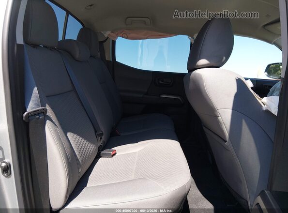 3TYCZ5AN3PT164686 2023 TOYOTA TACOMA Silver Widok naklejki z numerem VIN