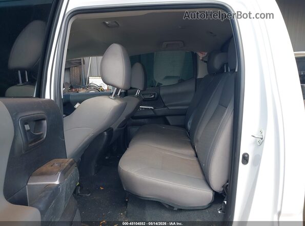 3TYCZ5ANXPT172820 2023 TOYOTA TACOMA White VIN კოდის სტიკერის ხედი