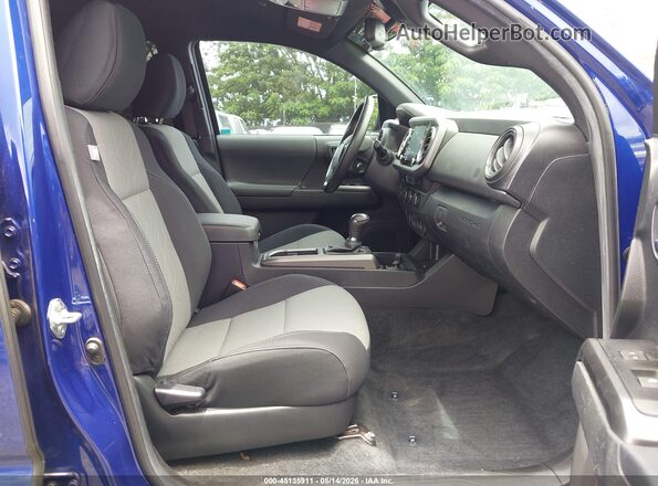 3TYDZ5BN7PT019590 2023 TOYOTA TACOMA Dark Blue Widok wnętrza z przodu