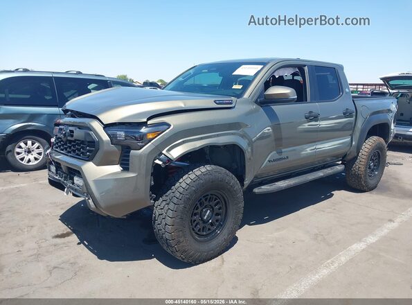 3TYLC5LN4TT060099 2026 TOYOTA TACOMA HYBRID Gold Vista tres cuartos delantera izquierda