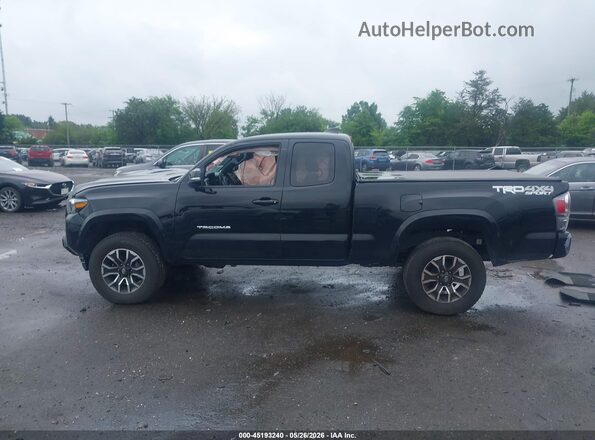 3TYSZ5ANXNT077215 2022 TOYOTA TACOMA Black Rear interior view