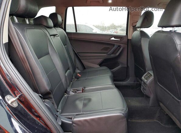 3VV2B7AX1KM063908 2019 VOLKSWAGEN TIGUAN Black Vista interior trasera