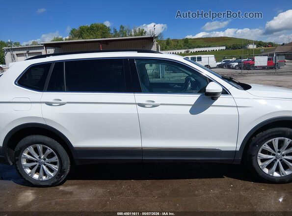 3VV2B7AX7JM152610 2018 VOLKSWAGEN TIGUAN White Widok wnętrza z tyłu