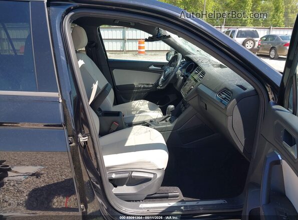 3VV2B7AX7MM038790 2021 VOLKSWAGEN TIGUAN Black Սալոնի դիմացի տեսք