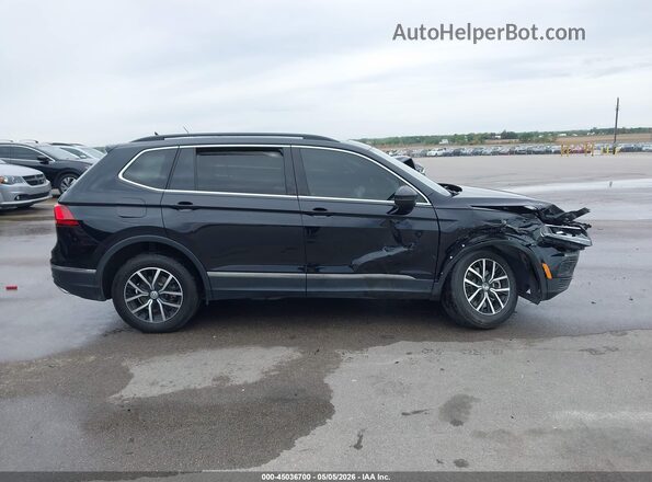 3VV2B7AX7MM071823 2021 VOLKSWAGEN TIGUAN Black Widok wnętrza z tyłu