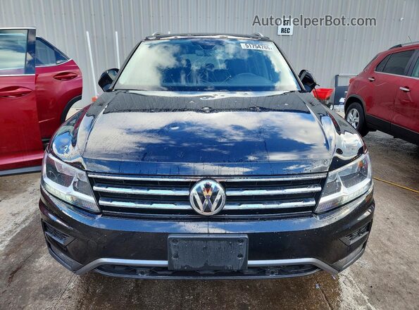 3VV2B7AX8MM072771 2021 VOLKSWAGEN TIGUAN Black Front view