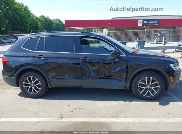 3VV3B7AX0KM090327 2019 VOLKSWAGEN TIGUAN Black Սալոնի հետևի տեսք