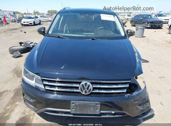 3VV3B7AX4MM136969 2021 VOLKSWAGEN TIGUAN Black Vista interior trasera