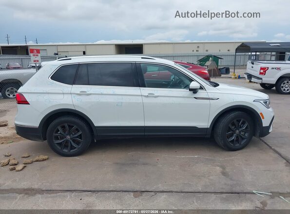 3VV3B7AX4RM056627 2024 VOLKSWAGEN TIGUAN White Սալոնի հետևի տեսք