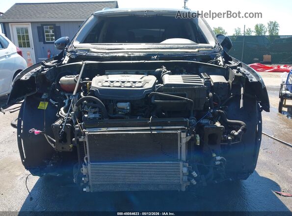 3VV3B7AX5MM096191 2021 VOLKSWAGEN TIGUAN Black Widok wnętrza z tyłu