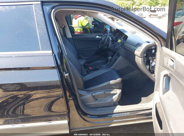 3VV3B7AX5MM096191 2021 VOLKSWAGEN TIGUAN Black Widok wnętrza z przodu