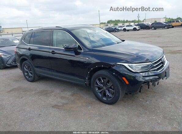 3VV3B7AX5NM067727 2022 VOLKSWAGEN TIGUAN Black Vista interior trasera