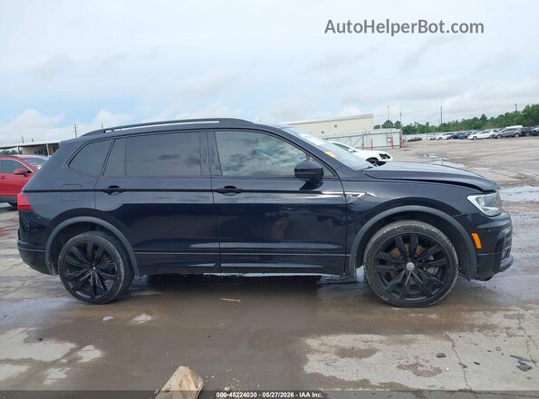 3VV3B7AX8LM152607 2020 VOLKSWAGEN TIGUAN Black Rear interior view