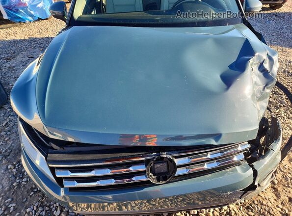 3VV3B7AX9KM137595 2019 VOLKSWAGEN TIGUAN Бирюзовый Вид задней части салона