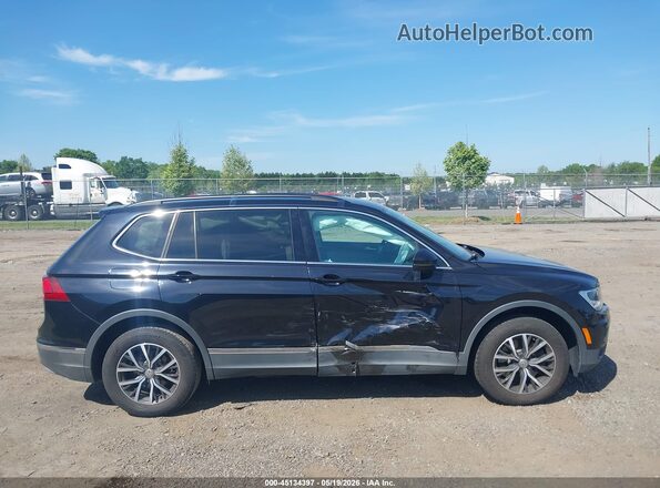 3VV3B7AX9LM037420 2020 VOLKSWAGEN TIGUAN Black Սալոնի հետևի տեսք