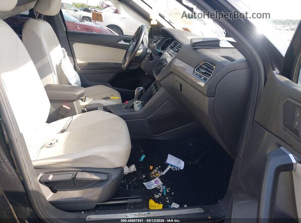 3VV3B7AX9LM067601 2020 VOLKSWAGEN TIGUAN Black Front interior view