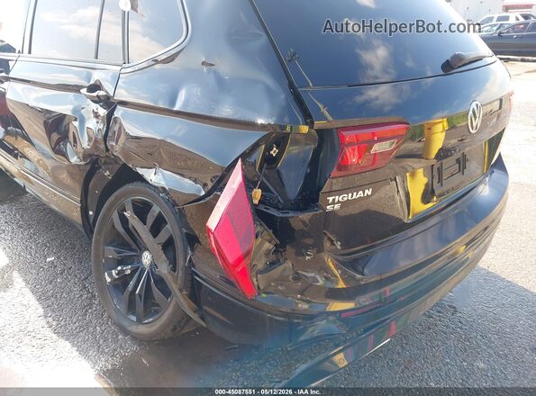 3VV3B7AX9LM067601 2020 VOLKSWAGEN TIGUAN Black Front view