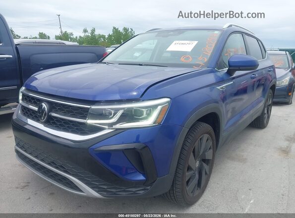 3VV4X7B24RM065952 2024 VOLKSWAGEN TAOS Синий Передняя левая четверть
