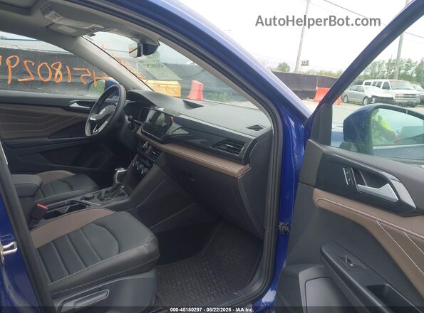 3VV4X7B24RM065952 2024 VOLKSWAGEN TAOS Синий Вид салона спереди