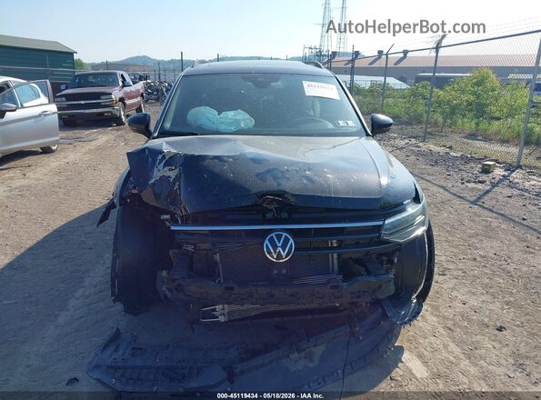 3VV8B7AX0NM047858 2022 VOLKSWAGEN TIGUAN Black Սալոնի հետևի տեսք