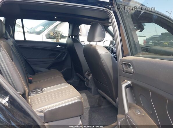 3VV8B7AX8PM138136 2023 VOLKSWAGEN TIGUAN Black VIN კოდის სტიკერის ხედი