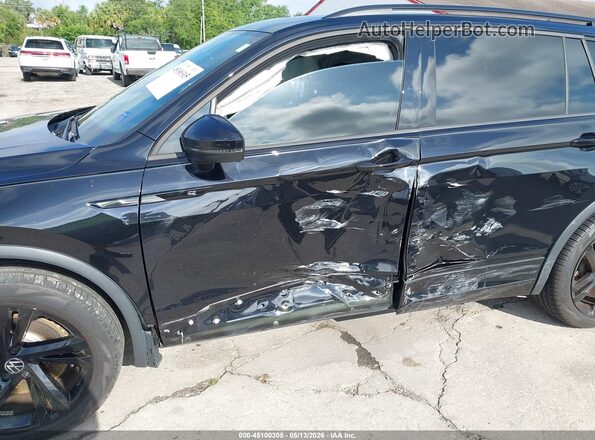 3VVCB7AX0PM107571 2023 VOLKSWAGEN TIGUAN Black Front view