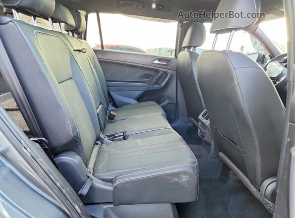 3VVCB7AX3PM038553 2023 VOLKSWAGEN TIGUAN Gray Vista interior trasera