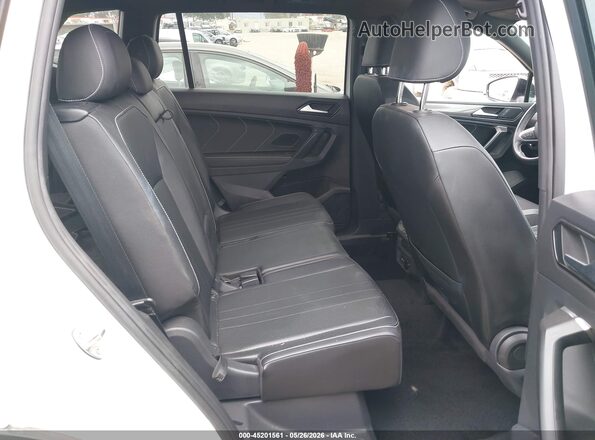 3VVCB7AX6PM098844 2023 VOLKSWAGEN TIGUAN White VIN sticker view
