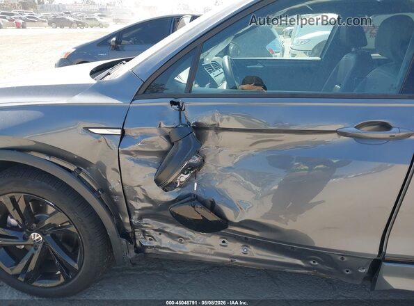 3VVCB7AX9PM066504 2023 VOLKSWAGEN TIGUAN Gray Front view