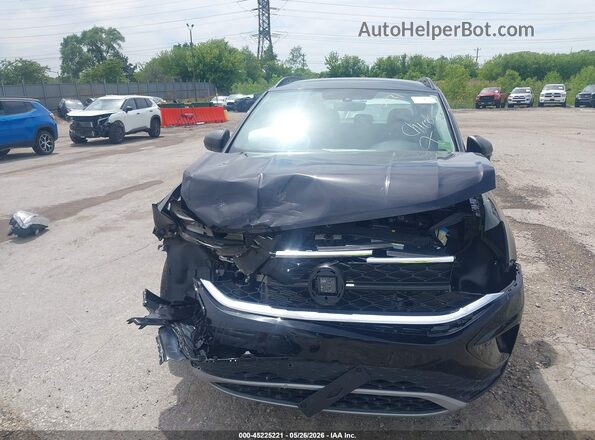 3VVCX7B22PM350707 2023 VOLKSWAGEN TAOS Black Սալոնի հետևի տեսք