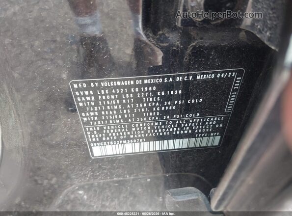 3VVCX7B22PM350707 2023 VOLKSWAGEN TAOS Black Շարժիչի բաժամունքի տեսք