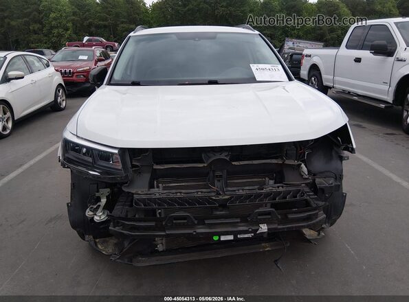 3VVCX7B27PM321445 2023 VOLKSWAGEN TAOS Белый Вид задней части салона